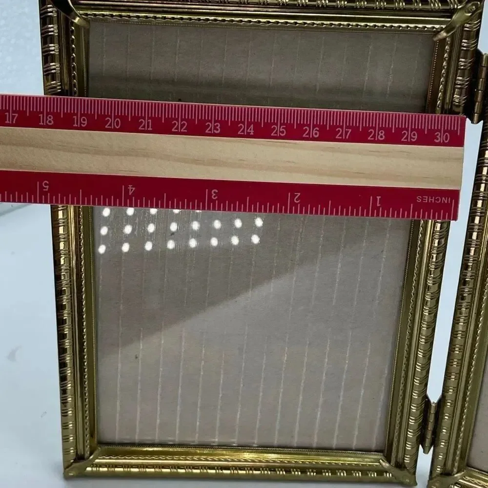 Vintage gold tone hinged double 5 X 7 frames